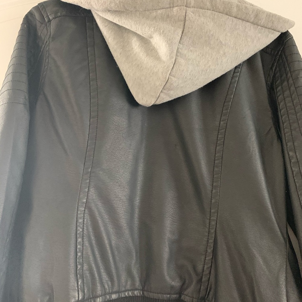 Faux black leather jacket with grey hoodie